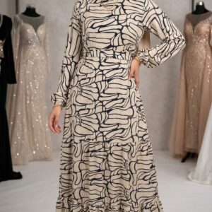 فستان محتشم بتصميم أنيق ونقشة ناعمة